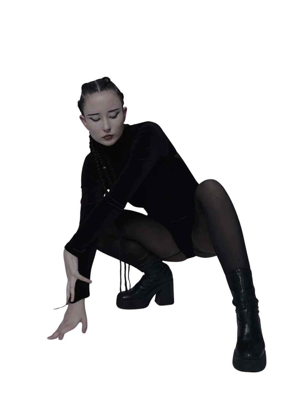 Lena — DJANE LENANE — crouching in her signature all-black look